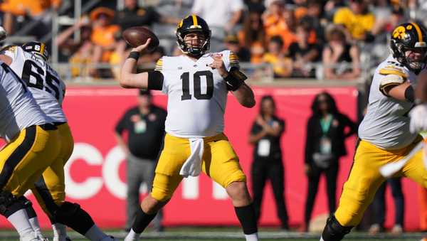 ORLANDO, FL - JANUARY 01; Iowa Hawkeyes quarterback Deacon Hill (10) makes a pass attempt during the 2024 Cheez-It Citrus Bowl between Iowa Hawkeyes and the Tennessee Volunteers on Monday, January 1, 2024 at Camping World Stadium, Orlando, Fla. (Photo by Peter Joneleit/Icon Sportswire via Getty Images)