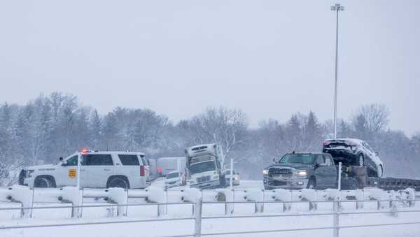 DES MOINES, IOWA - JANUARY 09: Crews work to free stuck vehicles on I-80 as a snowstorm dumps several inches of snow on the area on January 09, 2024 in Des Moines, Iowa. A weather system is bringing the first winter snowfall to central Iowa as voters prepare for the Republican Party of Iowa's presidential caucuses on January 15th. (Photo by Tasos Katopodis/Getty Images)