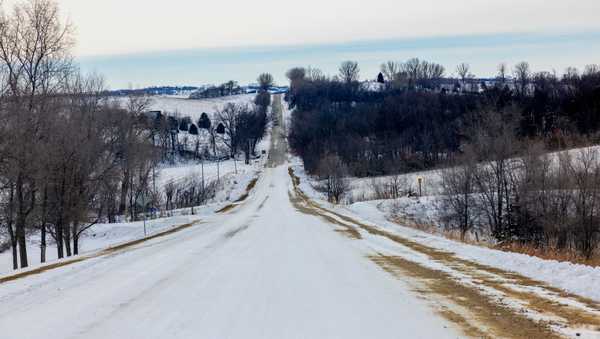 DENISON, IOWA - JANUARY 17, 2024: Snow covered rolling hills along a rural road on January 17, 2024 in Denison, Iowa. The town is 50% Latino.(Gina Ferazzi / Los Angeles Times via Getty Images)
