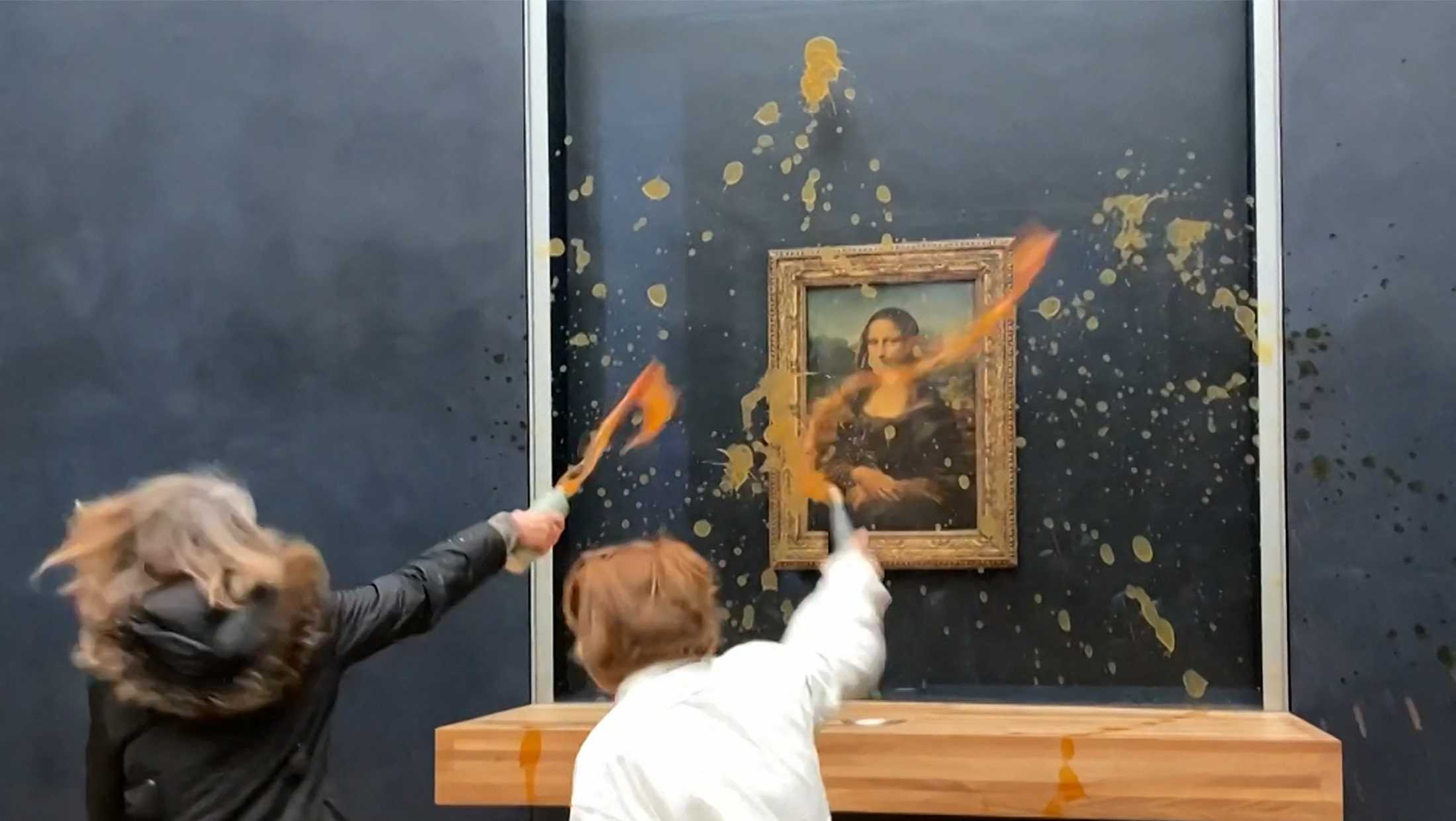 Climate activists throw soup at glass protecting Mona Lisa in Paris - Vimarsana News