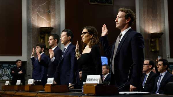 WASHINGTON, DC - JANUARY 31:  (L-R) Jason Citron, CEO of Discord, Evan Spiegel, CEO of Snap, Shou Zi Chew, CEO of TikTok, Linda Yaccarino, CEO of X, and Mark Zuckerberg, CEO of Meta are sworn-in as they testify before the Senate Judiciary Committee at the Dirksen Senate Office Building on January 31, 2024 in Washington, DC. The committee heard testimony from the heads of the largest tech firms on the dangers of child sexual exploitation on social media. (Photo by Anna Moneymaker/Getty Images)