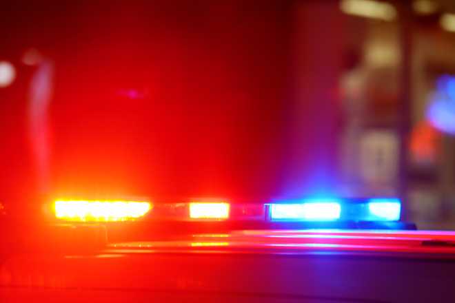 accident or crime scene concept - flashing police lights