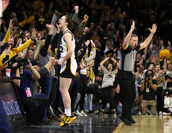 IOWA&#x20;CITY,&#x20;IOWA-&#x20;FEBRUARY&#x20;15&#x3A;&#x20;&#x20;Guard&#x20;Caitlin&#x20;Clark&#x20;&#x23;22&#x20;of&#x20;the&#x20;Iowa&#x20;Hawkeyes&#x20;celebrates&#x20;after&#x20;breaking&#x20;the&#x20;NCAA&#x20;women&amp;apos&#x3B;s&#x20;all-time&#x20;scoring&#x20;record&#x20;during&#x20;the&#x20;first&#x20;half&#x20;against&#x20;the&#x20;Michigan&#x20;Wolverines&#x20;&#x20;at&#x20;Carver-Hawkeye&#x20;Arena&#x20;on&#x20;February&#x20;15,&#x20;2024&#x20;in&#x20;Iowa&#x20;City,&#x20;Iowa.&#x20;&#x20;&#x28;Photo&#x20;by&#x20;Matthew&#x20;Holst&#x2F;Getty&#x20;Images&#x29;