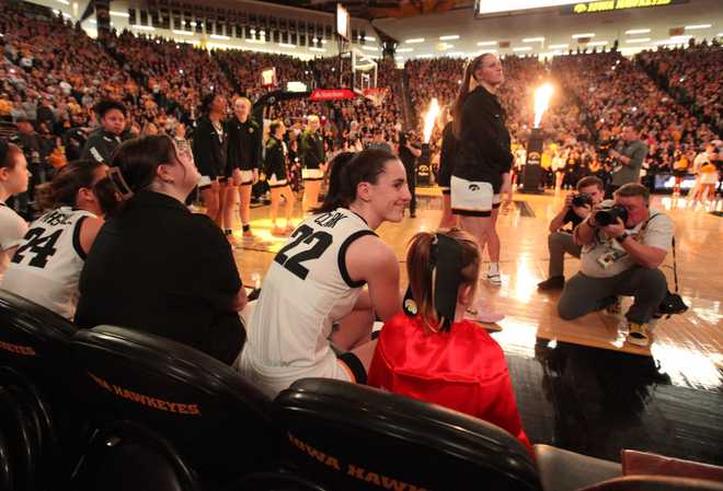 IOWA&#x20;CITY,&#x20;IOWA-&#x20;FEBRUARY&#x20;15&#x3A;&#x20;&#x20;Guard&#x20;Caitlin&#x20;Clark&#x20;&#x23;22&#x20;of&#x20;the&#x20;Iowa&#x20;Hawkeyes&#x20;waits&#x20;to&#x20;be&#x20;introduced&#x20;before&#x20;the&#x20;game&#x20;against&#x20;the&#x20;Michigan&#x20;Wolverines&#x20;at&#x20;Carver-Hawkeye&#x20;Arena&#x20;on&#x20;February&#x20;15,&#x20;2024&#x20;in&#x20;Iowa&#x20;City,&#x20;Iowa.&#x20;&#x20;&#x28;Photo&#x20;by&#x20;Matthew&#x20;Holst&#x2F;Getty&#x20;Images&#x29;