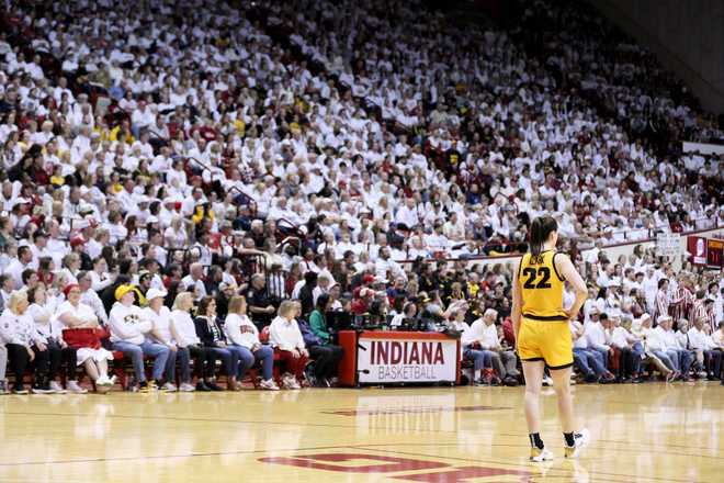 BLOOMINGTON,&#x20;INDIANA&#x20;-&#x20;FEBRUARY&#x20;22&#x3A;&#x20;Caitlin&#x20;Clark&#x20;&#x23;22&#x20;stands&#x20;in&#x20;front&#x20;out&#x20;crowd&#x20;for&#x20;the&#x20;Iowa&#x20;Hawkeyes&#x20;game&#x20;against&#x20;the&#x20;Indiana&#x20;Hoosiers&#x20;at&#x20;Simon&#x20;Skjodt&#x20;Assembly&#x20;Hall&#x20;on&#x20;February&#x20;22,&#x20;2024&#x20;in&#x20;Bloomington,&#x20;Indiana.&#x20;&#x28;Photo&#x20;by&#x20;Andy&#x20;Lyons&#x2F;Getty&#x20;Images&#x29;