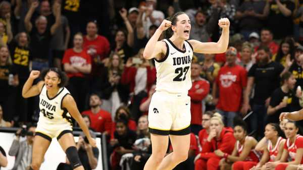 IOWA CITY, IOWA- MARCH 3:  Guard Caitlin Clark #22 of the Iowa Hawkeyes celebrates after breaking Pete Maravich's all-time NCAA scoring record during the first half against the Ohio State Buckeyes at Carver-Hawkeye Arena on March 3, 2024 in Iowa City, Iowa.  (Photo by Matthew Holst/Getty Images)