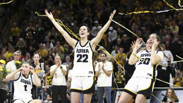 IOWA CITY, IOWA- MARCH 3:  Guard Caitlin Clark #22 and guard Kate Martin #20  of the Iowa Hawkeyes celebrates in the confetti after senior day festivities  after the match-up against the Ohio State Buckeyes at Carver-Hawkeye Arena on March 3, 2024 in Iowa City, Iowa.  (Photo by Matthew Holst/Getty Images)