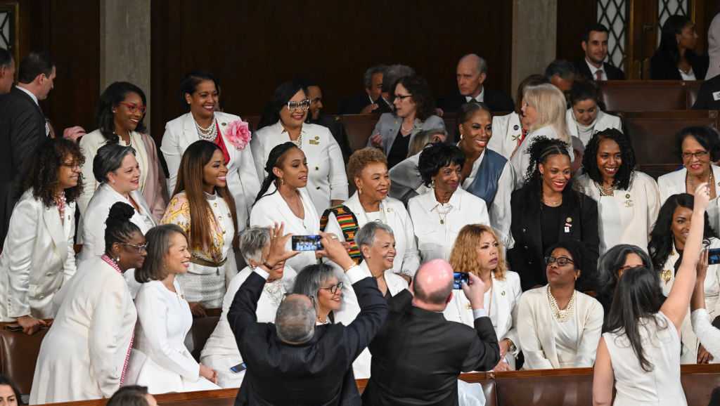 Members Of Democratic Womens Caucus To Wear White Pins For