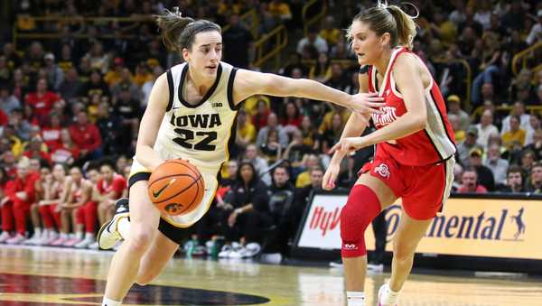 IOWA CITY, IOWA- MARCH 3: Guard Caitlin Clark #22 of the Iowa Hawkeyes goes to the basket during the second half against guard Jacy Sheldon #4 the Ohio State Buckeyes at Carver-Hawkeye Arena on March 3, 2024 in Iowa City, Iowa. (Photo by Matthew Holst/Getty Images)