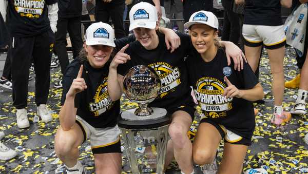 MINNEAPOLIS, MN - MARCH 10: Iowa Hawkeyes guard Caitlin Clark (22) celebrates with guard Kate Martin (20) and guard Gabbie Marshall (24) after the Big Ten Women's Basketball Tournament championship game between the Iowa Hawkeyes and Nebraska Cornhuskers on March 10, 2024, at the Target Center in Minneapolis, MN. (Photo by Bailey Hillesheim/Icon Sportswire via Getty Images)