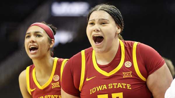 KANSAS CITY, MO - MARCH 11: Iowa State Cyclones center Audi Crooks (55) and forward Jalynn Bristow (1) yell from the bench to celebrate a block in the second quarter of a women's Big 12 tournament semifinal game between the Iowa State Cyclones and Oklahoma Sooners on Mar 11, 2024 at T-Mobile Center in Kansas City, MO. (Photo by Scott Winters/Icon Sportswire via Getty Images)