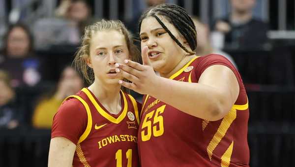 KANSAS CITY, MO - MARCH 12: Iowa State Cyclones center Audi Crooks (55) and guard Emily Ryan (11) huddle to discuss strategy in the fourth quarter of the women's Big 12 tournament final between the Iowa State Cyclones and Texas Longhorns on Mar 12, 2024 at T-Mobile Center in Kansas City, MO. (Photo by Scott Winters/Icon Sportswire via Getty Images)