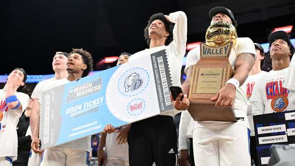 ST. LOUIS, MO - MARCH 10: Drake players watch the highlights of the championship game after winning the Missouri Valley Conference Tournament championship game between the Indiana State Sycamore and the Drake Bulldogs on March 10, 2024, at Enterprise Center in St. Louis, MO. (Photo by Keith Gillett/Icon Sportswire via Getty Images)