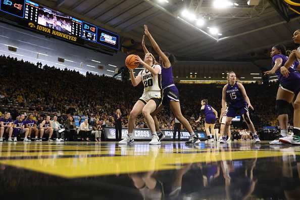 IOWA&#x20;CITY,&#x20;IOWA&#x20;-&#x20;MARCH&#x20;23&#x3A;&#x20;Kate&#x20;Martin&#x20;&#x23;20&#x20;of&#x20;the&#x20;Iowa&#x20;Hawkeyes&#x20;goes&#x20;up&#x20;for&#x20;a&#x20;basket&#x20;against&#x20;the&#x20;Holy&#x20;Cross&#x20;Crusaders&#x20;during&#x20;the&#x20;first&#x20;round&#x20;of&#x20;the&#x20;2024&#x20;NCAA&#x20;Women&amp;apos&#x3B;s&#x20;Basketball&#x20;Tournament&#x20;held&#x20;at&#x20;Carver-Hawkeye&#x20;Arena&#x20;on&#x20;March&#x20;23,&#x20;2024&#x20;in&#x20;Iowa&#x20;City,&#x20;Iowa.&#x20;&#x28;Photo&#x20;by&#x20;Rebecca&#x20;Gratz&#x2F;NCAA&#x20;Photos&#x20;via&#x20;Getty&#x20;Images&#x29;