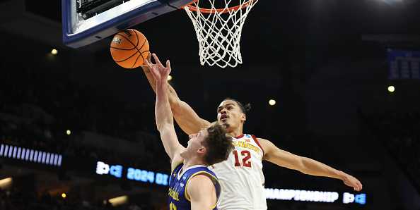 OMAHA,&#x20;NEBRASKA&#x20;-&#x20;MARCH&#x20;21&#x3A;&#x20;Robert&#x20;Jones&#x20;&#x23;12&#x20;of&#x20;the&#x20;Iowa&#x20;State&#x20;Cyclones&#x20;defends&#x20;the&#x20;shot&#x20;attempt&#x20;by&#x20;Kalen&#x20;Garry&#x20;&#x23;10&#x20;of&#x20;the&#x20;South&#x20;Dakota&#x20;State&#x20;Jackrabbits&#x20;during&#x20;the&#x20;first&#x20;half&#x20;in&#x20;the&#x20;first&#x20;round&#x20;of&#x20;the&#x20;NCAA&#x20;Men&amp;apos&#x3B;s&#x20;Basketball&#x20;Tournament&#x20;at&#x20;CHI&#x20;Health&#x20;Center&#x20;on&#x20;March&#x20;21,&#x20;2024&#x20;in&#x20;Omaha,&#x20;Nebraska.&#x20;&#x28;Photo&#x20;by&#x20;Jamie&#x20;Squire&#x2F;Getty&#x20;Images&#x29;