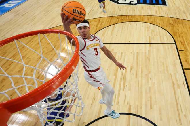 OMAHA,&#x20;NEBRASKA&#x20;-&#x20;MARCH&#x20;21&#x3A;&#x20;Tamin&#x20;Lipsey&#x20;&#x23;3&#x20;of&#x20;the&#x20;Iowa&#x20;State&#x20;Cyclones&#x20;shoots&#x20;the&#x20;ball&#x20;past&#x20;Charlie&#x20;Easley&#x20;&#x23;30&#x20;of&#x20;the&#x20;South&#x20;Dakota&#x20;State&#x20;Jackrabbits&#x20;during&#x20;the&#x20;first&#x20;half&#x20;in&#x20;the&#x20;first&#x20;round&#x20;of&#x20;the&#x20;NCAA&#x20;Men&amp;apos&#x3B;s&#x20;Basketball&#x20;Tournament&#x20;at&#x20;CHI&#x20;Health&#x20;Center&#x20;on&#x20;March&#x20;21,&#x20;2024&#x20;in&#x20;Omaha,&#x20;Nebraska.&#x20;&#x28;Photo&#x20;by&#x20;Michael&#x20;Reaves&#x2F;Getty&#x20;Images&#x29;