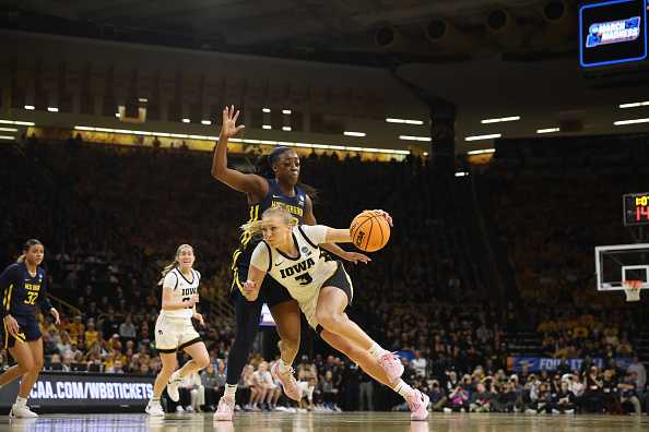 IOWA&#x20;CITY,&#x20;IOWA&#x20;-&#x20;MARCH&#x20;25&#x3A;&#x20;Sydney&#x20;Affolter&#x20;&#x23;3&#x20;of&#x20;the&#x20;Iowa&#x20;Hawkeyes&#x20;dribbles&#x20;the&#x20;ball&#x20;around&#x20;Jayla&#x20;Hemingway&#x20;&#x23;00&#x20;of&#x20;the&#x20;West&#x20;Virginia&#x20;Mountaneers&#x20;during&#x20;the&#x20;second&#x20;round&#x20;of&#x20;the&#x20;2024&#x20;NCAA&#x20;Women&amp;apos&#x3B;s&#x20;Basketball&#x20;Tournament&#x20;held&#x20;at&#x20;Carver-Hawkeye&#x20;Arena&#x20;on&#x20;March&#x20;25,&#x20;2024&#x20;in&#x20;Iowa&#x20;City,&#x20;Iowa.&#x20;&#x28;Photo&#x20;by&#x20;Rebecca&#x20;Gratz&#x2F;NCAA&#x20;Photos&#x20;via&#x20;Getty&#x20;Images&#x29;
