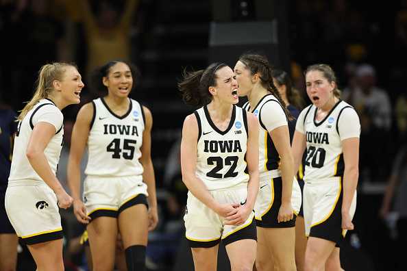 IOWA&#x20;CITY,&#x20;IOWA&#x20;-&#x20;MARCH&#x20;25&#x3A;&#x20;Caitlin&#x20;Clark&#x20;&#x23;22&#x20;of&#x20;the&#x20;Iowa&#x20;Hawkeyes&#x20;reacts&#x20;after&#x20;a&#x20;play&#x20;against&#x20;the&#x20;West&#x20;Virginia&#x20;Mountaneers&#x20;during&#x20;the&#x20;second&#x20;round&#x20;of&#x20;the&#x20;2024&#x20;NCAA&#x20;Women&amp;apos&#x3B;s&#x20;Basketball&#x20;Tournament&#x20;held&#x20;at&#x20;Carver-Hawkeye&#x20;Arena&#x20;on&#x20;March&#x20;25,&#x20;2024&#x20;in&#x20;Iowa&#x20;City,&#x20;Iowa.&#x20;&#x28;Photo&#x20;by&#x20;Rebecca&#x20;Gratz&#x2F;NCAA&#x20;Photos&#x20;via&#x20;Getty&#x20;Images&#x29;