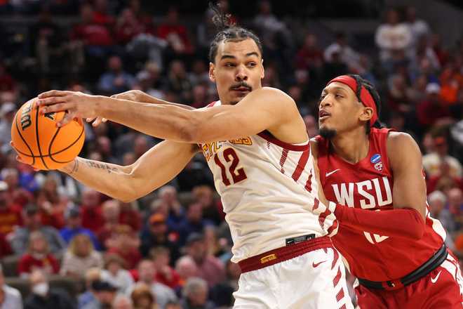 OMAHA,&#x20;NEBRASKA&#x20;-&#x20;MARCH&#x20;23&#x3A;&#x20;Isaiah&#x20;Watts&#x20;&#x23;12&#x20;of&#x20;the&#x20;Washington&#x20;State&#x20;Cougars&#x20;defends&#x20;against&#x20;Robert&#x20;Jones&#x20;&#x23;12&#x20;of&#x20;the&#x20;Iowa&#x20;State&#x20;Cyclones&#x20;during&#x20;the&#x20;second&#x20;half&#x20;in&#x20;the&#x20;second&#x20;round&#x20;of&#x20;the&#x20;NCAA&#x20;Men&amp;apos&#x3B;s&#x20;Basketball&#x20;Tournament&#x20;at&#x20;CHI&#x20;Health&#x20;Center&#x20;on&#x20;March&#x20;23,&#x20;2024&#x20;in&#x20;Omaha,&#x20;Nebraska.&#x20;&#x28;Photo&#x20;by&#x20;Michael&#x20;Reaves&#x2F;Getty&#x20;Images&#x29;