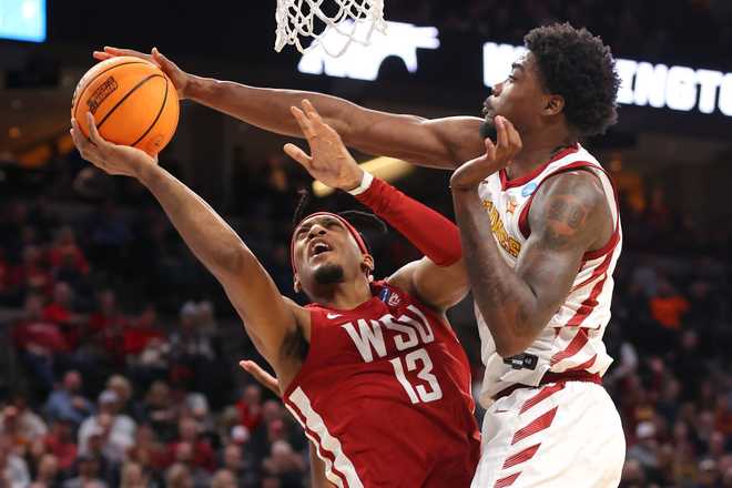 OMAHA,&#x20;NEBRASKA&#x20;-&#x20;MARCH&#x20;23&#x3A;&#x20;Hason&#x20;Ward&#x20;&#x23;24&#x20;of&#x20;the&#x20;Iowa&#x20;State&#x20;Cyclones&#x20;blocks&#x20;a&#x20;shot&#x20;by&#x20;Isaac&#x20;Jones&#x20;&#x23;13&#x20;of&#x20;the&#x20;Washington&#x20;State&#x20;Cougars&#x20;during&#x20;the&#x20;second&#x20;half&#x20;in&#x20;the&#x20;second&#x20;round&#x20;of&#x20;the&#x20;NCAA&#x20;Men&amp;apos&#x3B;s&#x20;Basketball&#x20;Tournament&#x20;at&#x20;CHI&#x20;Health&#x20;Center&#x20;on&#x20;March&#x20;23,&#x20;2024&#x20;in&#x20;Omaha,&#x20;Nebraska.&#x20;&#x28;Photo&#x20;by&#x20;Michael&#x20;Reaves&#x2F;Getty&#x20;Images&#x29;