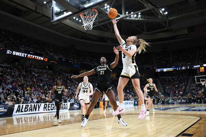 ALBANY,&#x20;NEW&#x20;YORK&#x20;-&#x20;MARCH&#x20;30&#x3A;&#x20;Sydney&#x20;Affolter&#x20;&#x23;3&#x20;of&#x20;the&#x20;Iowa&#x20;Hawkeyes&#x20;jumps&#x20;towards&#x20;the&#x20;basket&#x20;over&#x20;Aaronette&#x20;Vonleh&#x20;&#x23;21&#x20;of&#x20;the&#x20;Colorado&#x20;Buffaloes&#x20;during&#x20;the&#x20;Sweet&#x20;Sixteen&#x20;round&#x20;of&#x20;the&#x20;2024&#x20;NCAA&#x20;Women&amp;apos&#x3B;s&#x20;Basketball&#x20;Tournament&#x20;held&#x20;at&#x20;MVP&#x20;Arena&#x20;on&#x20;March&#x20;30,&#x20;2024&#x20;in&#x20;Albany,&#x20;New&#x20;York.&#x20;&#x28;Photo&#x20;by&#x20;Scott&#x20;Taetsch&#x2F;NCAA&#x20;Photos&#x20;via&#x20;Getty&#x20;Images&#x29;