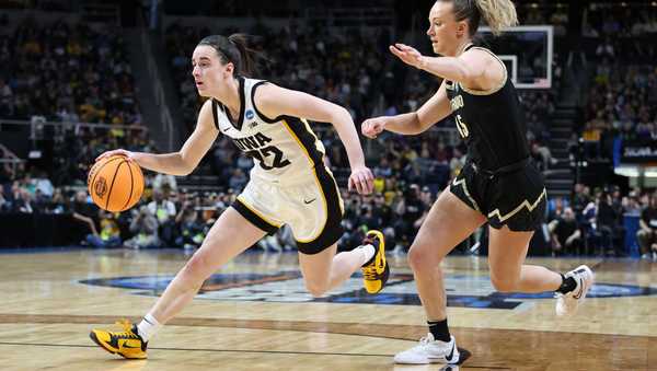 ALBANY, NEW YORK - MARCH 30: Caitlin Clark #22 of the Iowa Hawkeyes dribbles down the court on offense against the Colorado Buffaloes during the Sweet Sixteen round of the 2024 NCAA Women's Basketball Tournament held at MVP Arena on March 30, 2024 in Albany, New York. (Photo by Scott Taetsch/NCAA Photos via Getty Images)