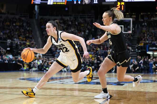 ALBANY,&#x20;NEW&#x20;YORK&#x20;-&#x20;MARCH&#x20;30&#x3A;&#x20;Caitlin&#x20;Clark&#x20;&#x23;22&#x20;of&#x20;the&#x20;Iowa&#x20;Hawkeyes&#x20;dribbles&#x20;down&#x20;the&#x20;court&#x20;on&#x20;offense&#x20;against&#x20;the&#x20;Colorado&#x20;Buffaloes&#x20;during&#x20;the&#x20;Sweet&#x20;Sixteen&#x20;round&#x20;of&#x20;the&#x20;2024&#x20;NCAA&#x20;Women&amp;apos&#x3B;s&#x20;Basketball&#x20;Tournament&#x20;held&#x20;at&#x20;MVP&#x20;Arena&#x20;on&#x20;March&#x20;30,&#x20;2024&#x20;in&#x20;Albany,&#x20;New&#x20;York.&#x20;&#x28;Photo&#x20;by&#x20;Scott&#x20;Taetsch&#x2F;NCAA&#x20;Photos&#x20;via&#x20;Getty&#x20;Images&#x29;