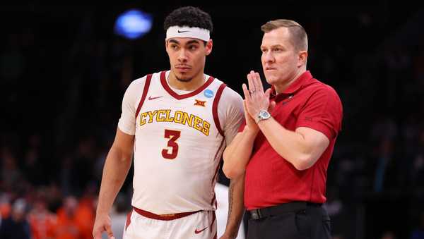 BOSTON, MASSACHUSETTS - MARCH 28: Head coach T. J. Otzelberger of the Iowa State Cyclones talks with Tamin Lipsey #3 against the Illinois Fighting Illini during the second half in the Sweet 16 round of the NCAA Men's Basketball Tournament at TD Garden on March 28, 2024 in Boston, Massachusetts. (Photo by Michael Reaves/Getty Images)