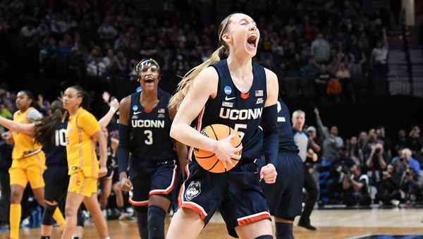 PORTLAND, OR - APRIL 01:  UConn Huskies guard Paige Bueckers (5) reacts after winning the game during a 2024 Div I Women's Basketball Championship Elite Eight game between the UConn Huskies and USC Trojans on April 1, 2024 at Moda Center in Portland, Oregon. (Photo by Brian Murphy/Icon Sportswire via Getty Images)