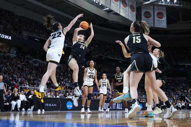 ALBANY,&#x20;NEW&#x20;YORK&#x20;-&#x20;MARCH&#x20;30&#x3A;&#x20;Caitlin&#x20;Clark&#x20;&#x23;22&#x20;of&#x20;the&#x20;Iowa&#x20;Hawkeyes&#x20;makes&#x20;a&#x20;block&#x20;on&#x20;Maddie&#x20;Nolan&#x20;&#x23;24&#x20;of&#x20;the&#x20;Colorado&#x20;Buffaloes&#x20;during&#x20;the&#x20;first&#x20;half&#x20;in&#x20;the&#x20;Sweet&#x20;16&#x20;round&#x20;of&#x20;the&#x20;NCAA&#x20;Women&amp;apos&#x3B;s&#x20;Basketball&#x20;Tournament&#x20;at&#x20;MVP&#x20;Arena&#x20;on&#x20;March&#x20;30,&#x20;2024&#x20;in&#x20;Albany,&#x20;New&#x20;York.&#x20;&#x28;Photo&#x20;by&#x20;Andy&#x20;Lyons&#x2F;Getty&#x20;Images&#x29;
