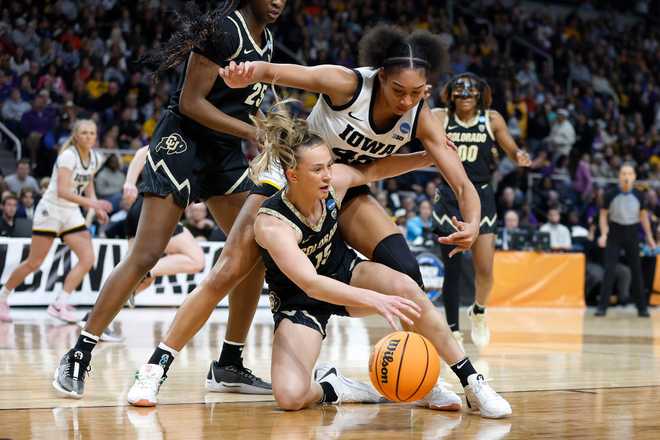 ALBANY,&#x20;NEW&#x20;YORK&#x20;-&#x20;MARCH&#x20;30&#x3A;&#x20;Kindyll&#x20;Wetta&#x20;&#x23;15&#x20;of&#x20;the&#x20;Colorado&#x20;Buffaloes&#x20;and&#x20;Hannah&#x20;Stuelke&#x20;&#x23;45&#x20;of&#x20;the&#x20;Iowa&#x20;Hawkeyes&#x20;battle&#x20;for&#x20;the&#x20;ball&#x20;during&#x20;the&#x20;first&#x20;half&#x20;in&#x20;the&#x20;Sweet&#x20;16&#x20;round&#x20;of&#x20;the&#x20;NCAA&#x20;Women&amp;apos&#x3B;s&#x20;Basketball&#x20;Tournament&#x20;at&#x20;MVP&#x20;Arena&#x20;on&#x20;March&#x20;30,&#x20;2024&#x20;in&#x20;Albany,&#x20;New&#x20;York.&#x20;&#x28;Photo&#x20;by&#x20;Sarah&#x20;Stier&#x2F;Getty&#x20;Images&#x29;