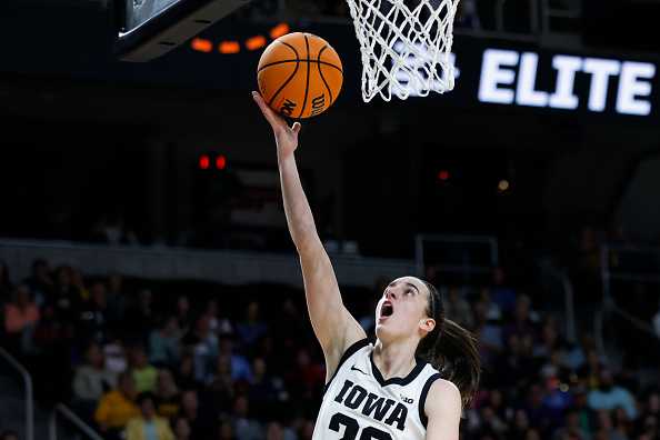 ALBANY,&#x20;NEW&#x20;YORK&#x20;-&#x20;APRIL&#x20;01&#x3A;Caitlin&#x20;Clark&#x20;&#x23;22&#x20;of&#x20;the&#x20;Iowa&#x20;Hawkeyes&#x20;shoots&#x20;the&#x20;ball&#x20;during&#x20;the&#x20;first&#x20;half&#x20;against&#x20;the&#x20;LSU&#x20;Tigers&#x20;in&#x20;the&#x20;Elite&#x20;8&#x20;round&#x20;of&#x20;the&#x20;NCAA&#x20;Women&amp;apos&#x3B;s&#x20;Basketball&#x20;Tournament&#x20;at&#x20;MVP&#x20;Arena&#x20;on&#x20;April&#x20;01,&#x20;2024&#x20;in&#x20;Albany,&#x20;New&#x20;York.&#x20;&#x28;Photo&#x20;by&#x20;Sarah&#x20;Stier&#x2F;Getty&#x20;Images&#x29;