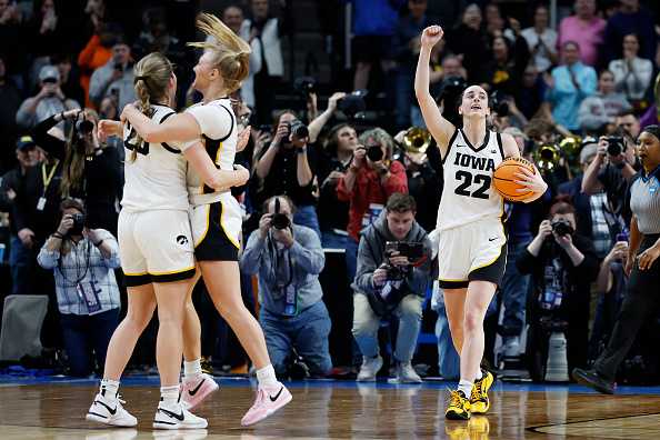 ALBANY,&#x20;NEW&#x20;YORK&#x20;-&#x20;APRIL&#x20;01&#x3A;&#x20;Caitlin&#x20;Clark&#x20;&#x23;22&#x20;of&#x20;the&#x20;Iowa&#x20;Hawkeyes&#x20;and&#x20;her&#x20;teammates&#x20;celebrate&#x20;after&#x20;beating&#x20;the&#x20;LSU&#x20;Tigers&#x20;94-45&#x20;in&#x20;the&#x20;Elite&#x20;8&#x20;round&#x20;of&#x20;the&#x20;NCAA&#x20;Women&amp;apos&#x3B;s&#x20;Basketball&#x20;Tournament&#x20;at&#x20;MVP&#x20;Arena&#x20;on&#x20;April&#x20;01,&#x20;2024&#x20;in&#x20;Albany,&#x20;New&#x20;York.&#x20;&#x28;Photo&#x20;by&#x20;Sarah&#x20;Stier&#x2F;Getty&#x20;Images&#x29;