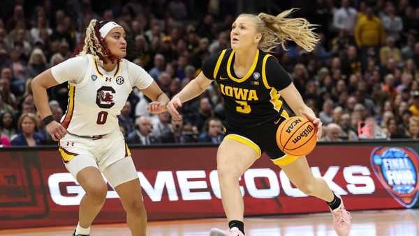 CLEVELAND, OHIO - APRIL 7: Sydney Affolter #3 of the Iowa Hawkeyes drives to the basket against Te-Hina Paopao #0 of the South Carolina Gamecocks during the NCAA Women's Basketball Tournament National Championship at Rocket Mortgage Fieldhouse on April 7, 2024 in Cleveland, Ohio. (Photo by Justin Tafoya/NCAA Photos via Getty Images)