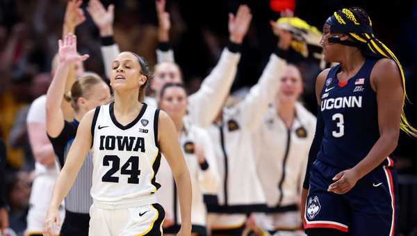 CLEVELAND, OHIO - APRIL 05: Gabbie Marshall #24 of the Iowa Hawkeyes and Aaliyah Edwards #3 of the UConn Huskies react in the second half during the NCAA Women's Basketball Tournament Final Four semifinal game at Rocket Mortgage Fieldhouse on April 05, 2024 in Cleveland, Ohio. (Photo by Gregory Shamus/Getty Images)