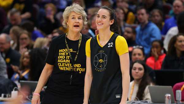 CLEVELAND, OHIO - APRIL 06: Head coach Lisa Bluder speaks to Caitlin Clark #22 of the Iowa Hawkeyes during an open practice session ahead of the 2024 NCAA Women's Basketball Final Four National Championship at Rocket Mortgage Fieldhouse on April 06, 2024 in Cleveland, Ohio. (Photo by Mike Lawrie/Getty Images)