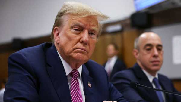Former US President Donald Trump attends his trial for allegedly covering up hush money payments linked to extramarital affairs, at Manhattan Criminal Court in New York City on April 19, 2024. A panel of 12 jurors was sworn in on April 18, 2024, for the unprecedented criminal trial of a former US president. (Photo by Spencer Platt / POOL / AFP) (Photo by SPENCER PLATT/POOL/AFP via Getty Images)