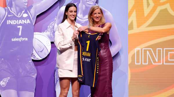 NEW YORK, NEW YORK - APRIL 15: Caitlin Clark poses with WNBA Commissioner Cathy Engelbert after being selected first overall pick by the Indiana Fever during the 2024 WNBA Draft at Brooklyn Academy of Music on April 15, 2024 in New York City. (Photo by Sarah Stier/Getty Images)