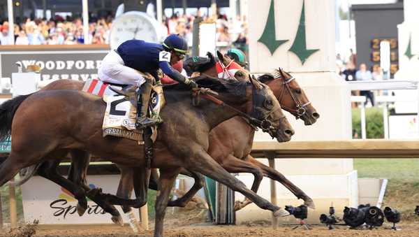 LOUISVILLE, KENTUCKY - MAY 04: Mystik Dan #3, ridden by jockey Brian J. Hernandez Jr. crosses the finish line to win the 150th running of the Kentucky Derby at Churchill Downs on May 04, 2024 in Louisville, Kentucky. (Photo by Justin Casterline/Getty Images)