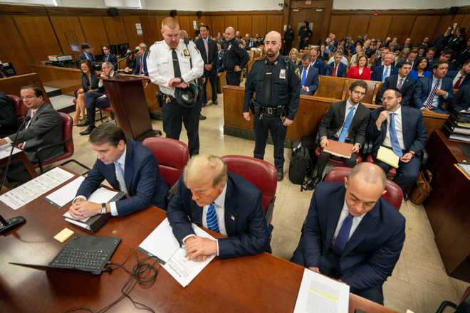 NEW YORK, NEW YORK - MAY 13 Former US President Donald Trump lawyer Todd Blanche Emile Bove attends his trial on suspicion of concealing hush money payments in Manhattan Criminal Court on May 13, 2024, New York City Trump was indicted on 34 counts last year of falsifying business records, which prosecutors claim was an 