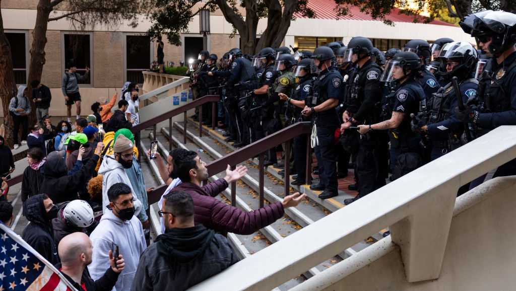 Law enforcement detains at least a dozen protesters at UC Irvine, as they clear encampment - Vimarsana News