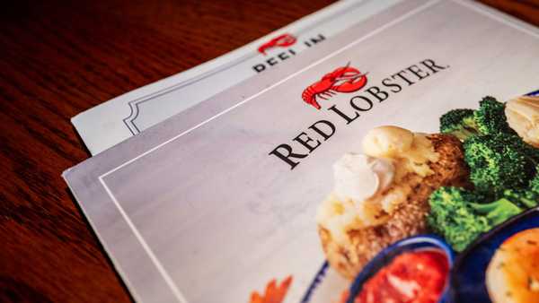 AUSTIN, TEXAS - MAY 20: In this photo illustration, a menu is displayed on a plate at a Red Lobster restaurant on May 20, 2024 in Austin, Texas. Red Lobster has filed for Chapter 11 bankruptcy protection after a failed lease-back agreement and "endless shrimp" promotion backfired against company revenue. (Photo Illustration by Brandon Bell/Getty Images)