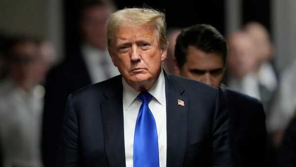 NEW YORK, NEW YORK - MAY 30:   Former U.S. President Donald Trump walks to speak to the media after being found guilty following his hush money trial at Manhattan Criminal Court on May 30, 2024 in New York City. The former president was found guilty on all 34 felony counts of falsifying business records in the first of his criminal cases to go to trial. Trump has now become the first former U.S. president to be convicted of felony crimes. (Photo by Seth Wenig-Pool/Getty Images)