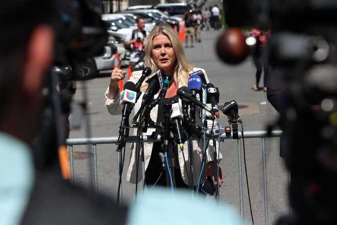 NEW YORK, NEW YORK - MAY 28: Trump 2024 National Press Secretary Karoline Leavitt speaks at a press conference during former U.S. President Donald Trump&apos;s hush money trial near Manhattan Criminal Court on May 28, 2024 in New York City. Closing arguments are under way in former U.S. President Trump&apos;s hush money trial. The former president faces 34 felony counts of falsifying business records in the first of his criminal cases to go to trial.  (Photo by Michael M. Santiago/Getty Images)