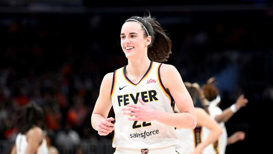 WASHINGTON, DC - JUNE 07: Caitlin Clark #22 of the Indiana Fever celebrates during the game against the Washington Mystics at Capital One Arena on June 07, 2024 in Washington, DC. NOTE TO USER: User expressly acknowledges and agrees that, by downloading and or using this photograph, User is consenting to the terms and conditions of the Getty Images License Agreement.