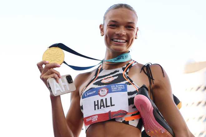 EUGENE,&#x20;OREGON&#x20;-&#x20;JUNE&#x20;24&#x3A;&#x20;Anna&#x20;Hall&#x20;poses&#x20;with&#x20;a&#x20;gold&#x20;medal&#x20;after&#x20;competing&#x20;in&#x20;the&#x20;women&amp;apos&#x3B;s&#x20;heptathlon&#x20;on&#x20;Day&#x20;Four&#x20;of&#x20;the&#x20;2024&#x20;U.S.&#x20;Olympic&#x20;Team&#x20;Track&#x20;&amp;amp&#x3B;&#x20;Field&#x20;Trials&#x20;at&#x20;Hayward&#x20;Field&#x20;on&#x20;June&#x20;24,&#x20;2024&#x20;in&#x20;Eugene,&#x20;Oregon.&#x20;&#x28;Photo&#x20;by&#x20;Christian&#x20;Petersen&#x2F;Getty&#x20;Images&#x29;