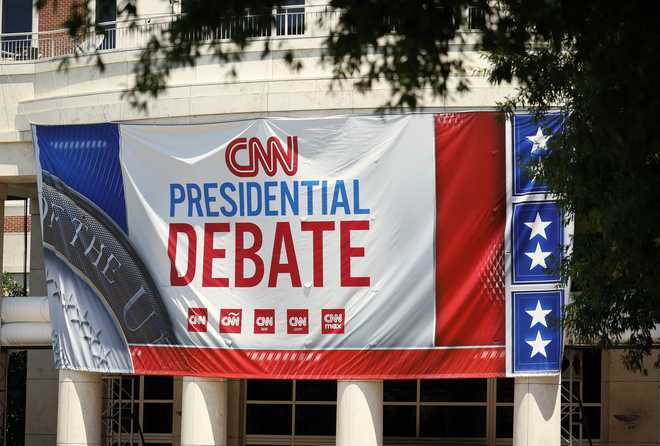 ATLANTA, GEORGIA - JUNE 26: Signage for a CNN presidential debate is seen outside of their studios at the Turner Entertainment Networks on June 26, 2024 in Atlanta, Georgia. U.S. President Joe Biden and Republican presidential candidate, former U.S. President Donald Trump will face off in the first presidential debate of the 2024 presidential cycle this Thursday. (Photo by Kevin Dietsch/Getty Images)