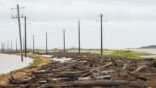 Debris blocks FM 2031, the main access road, after Hurricane Beryl came ashore nearby Monday, July 8, 2024, in Matagorda.