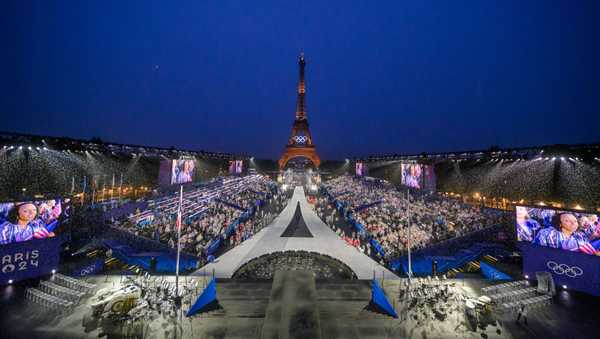 PARIS, FRANCE - JULY 26: Overview of the Trocadero venue with the first delegation arriving during the Opening Ceremony of the Olympic Games Paris 2024 on July 26, 2024 in Paris, France. (Photo by  François-Xavier Marit - Pool/Getty Images)