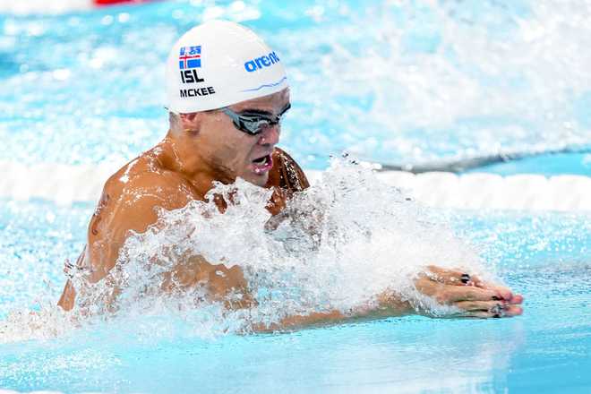 PARIS,&#x20;FRANCE&#x20;-&#x20;JULY&#x20;27&#x3A;&#x20;Anton&#x20;Mckee&#x20;of&#x20;Iceland&#x20;competes&#x20;in&#x20;the&#x20;men&amp;apos&#x3B;s&#x20;100m&#x20;breaststroke&#x20;heats&#x20;during&#x20;the&#x20;Olympic&#x20;Games&#x20;Paris&#x20;2024&#x20;at&#x20;La&#x20;Defense&#x20;Arena&#x20;in&#x20;Paris,&#x20;France&#x20;on&#x20;July&#x20;27,&#x20;2024.&#x20;&#x28;Photo&#x20;by&#x20;Mustafa&#x20;Ciftci&#x2F;Anadolu&#x20;via&#x20;Getty&#x20;Images&#x29;